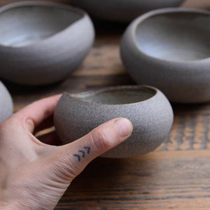 "PEBBLE" wheel thrown bowls, altered, stoneware